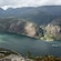 A view of Akrafjord, Norway with steep cliffs and a waterfall to the right